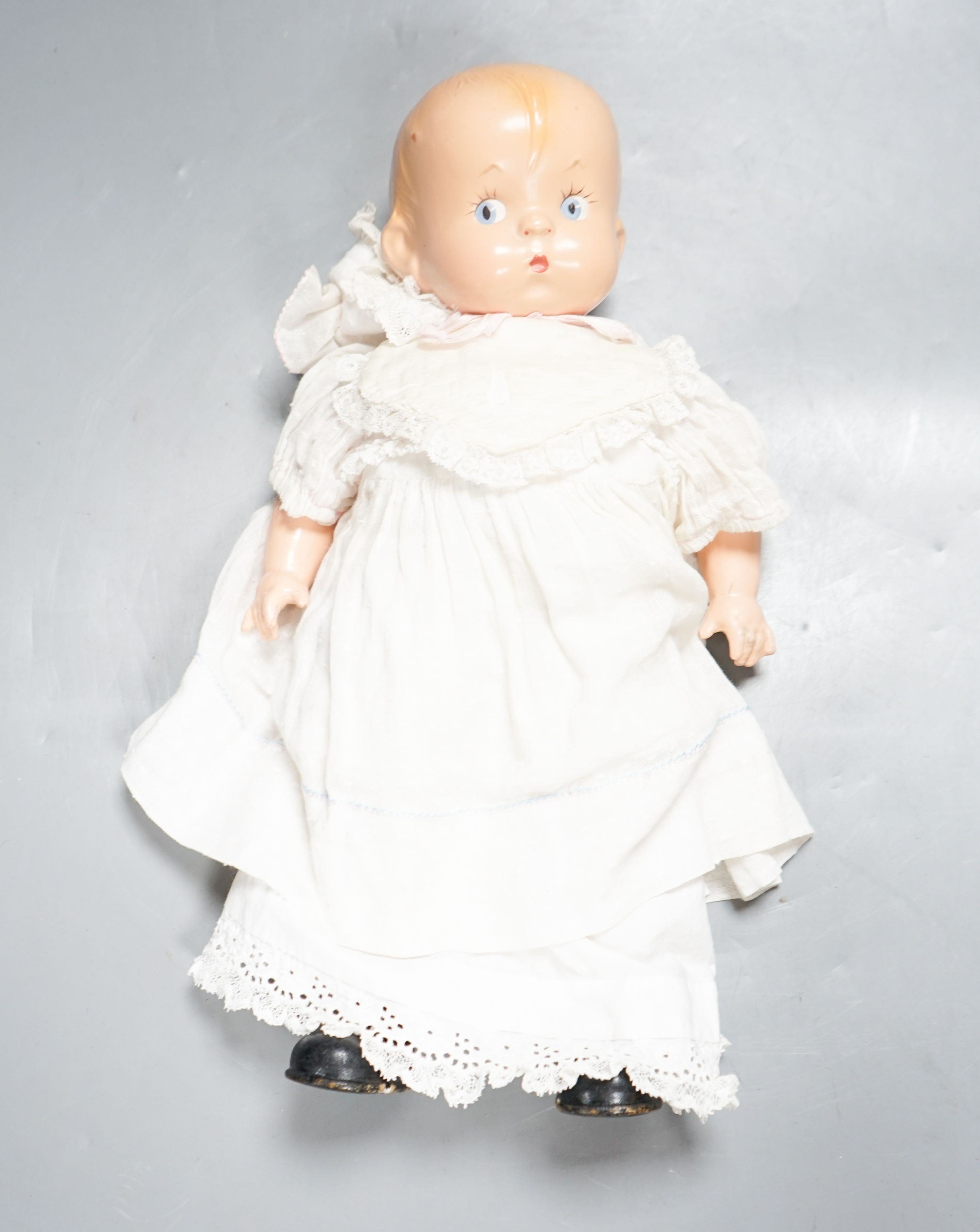 An Effanbee toddler doll, height 13in., in good condition
